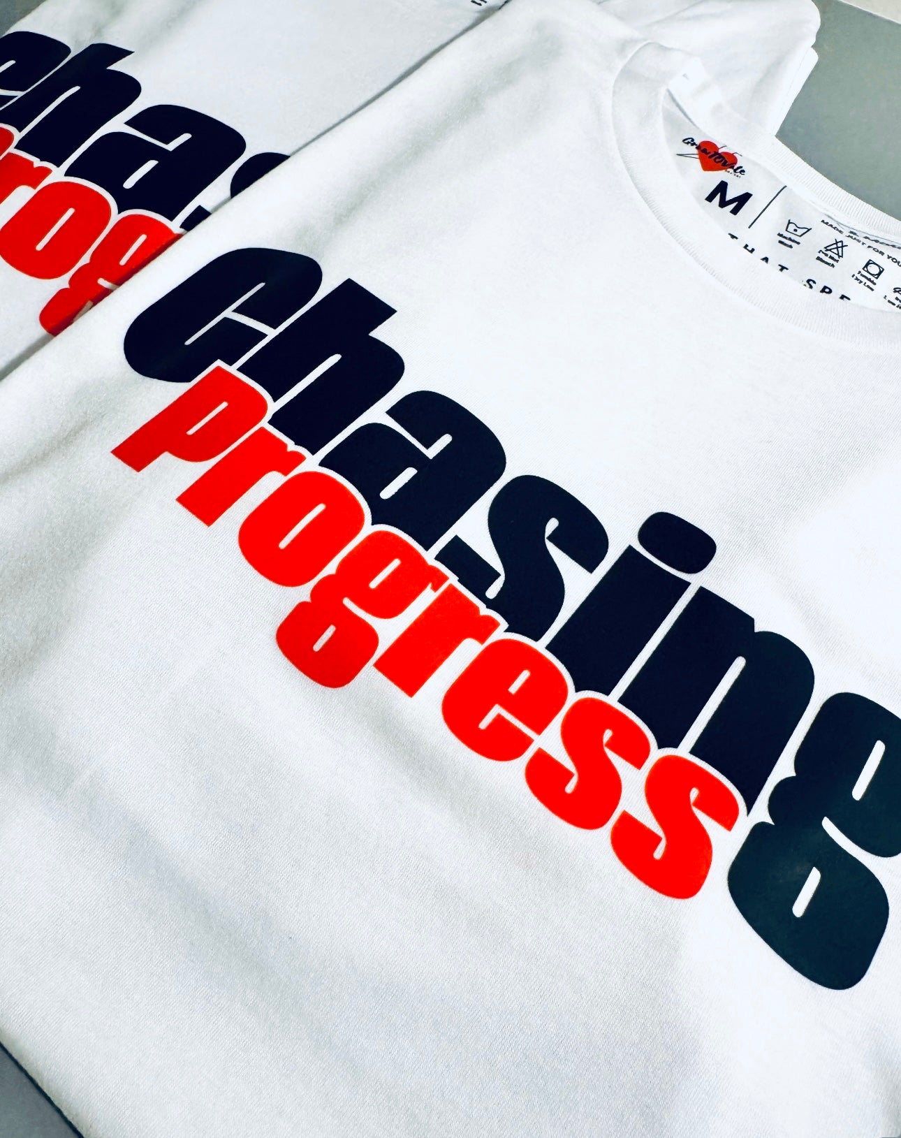 Chasing Progress Unisex T-shirt